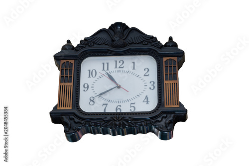 Vintage decorative wall clock with ornate black frame and gold accents