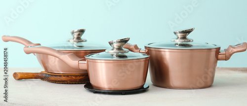 Shiny cooking pots with fry...