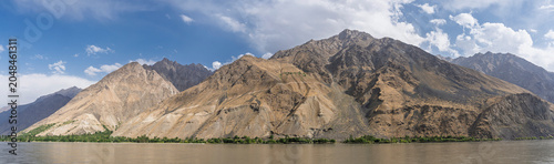 Scenic mountain landscape panorama of Panj river valley border with Afghanistan near Khorog, Gorno-Badakhshan, Tajikistan Pamir