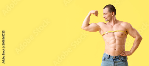 Male bodybuilder with tape ...