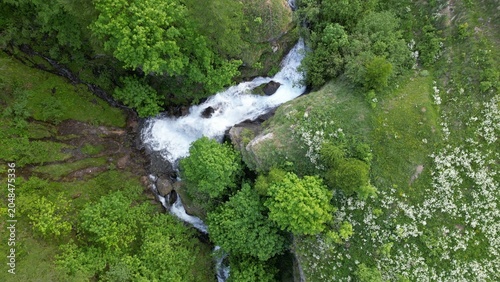 Europe, Italy, Alpeggio Balma di Rodoretto , Prali , Turin is a small mountain village with a stream of water due to the melting of the glacier ice - climate change and global warming save the planet