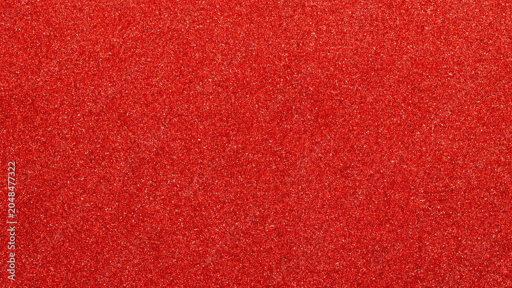 Fototapeta premium Sparkling red glitter texture background with shimmer effect for festive celebration