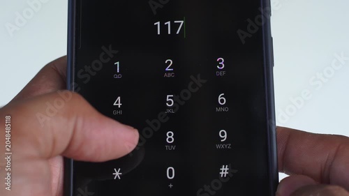 Emergency and urgency, dialing 117 on smartphone screen. Portuguese national emergency number for fires