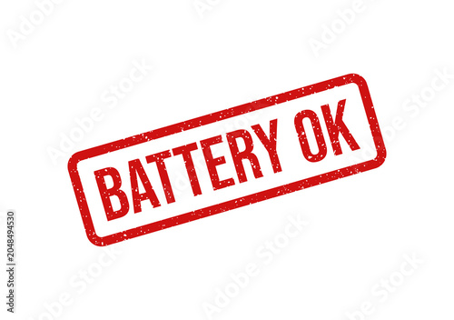 Red rubber stamp with battery ok text