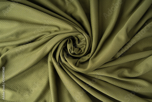 Sport cloth fabric texture background, olive green soccer shirt pattern
