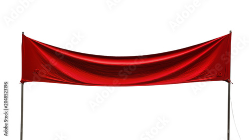 Obraz na plátně Isolated vibrant red fabric banner gracefully hanging between two sturdy support