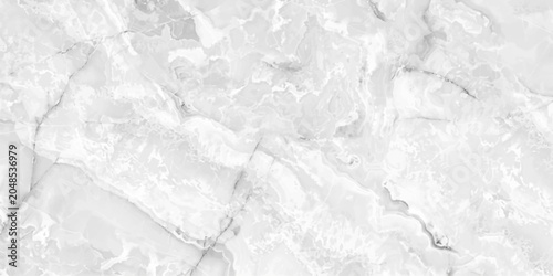 Photography A close-up shot of a smooth, polished marble surface, showcasing its intricate veining and elegant texture in subtle shades of grey and white