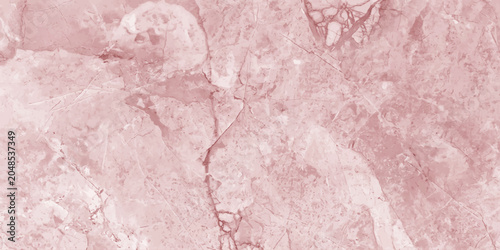 Photos A soft pink marble texture with subtle veins of darker pink and cream, creating an elegant and luxurious background for design