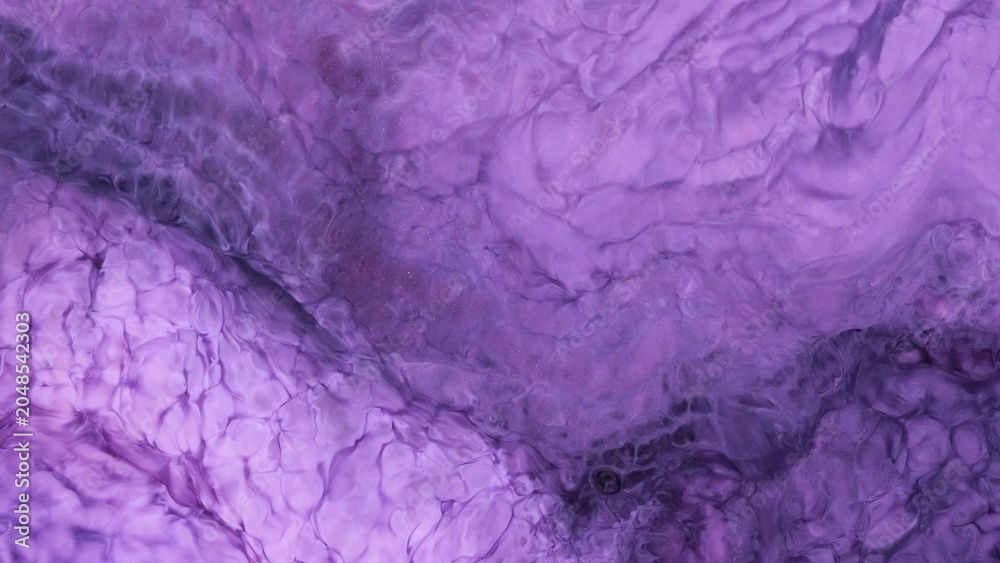 Obraz premium Exploring the movement and colors of alcohol ink in an abstract video art piece