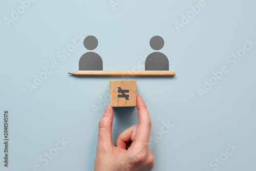 Foto Social Inequality and Discrimination Concept with Unequal Balance