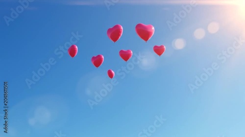 Pink Heart Balloons Floating in a Bright Blue Sky, Symbolizing Love and Celebration.