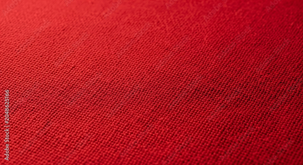 Fototapeta premium Red woven fabric texture fills the frame a close up view of the textile s detailed surface weave