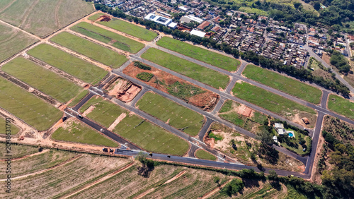 Fotografie Aerial view of a new housing development under construction with roads and clear