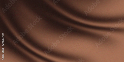 Diagonal light and shadow gradations with warm brown colors, also with a similar speckled texture, create a minimalist and artistic impression.	