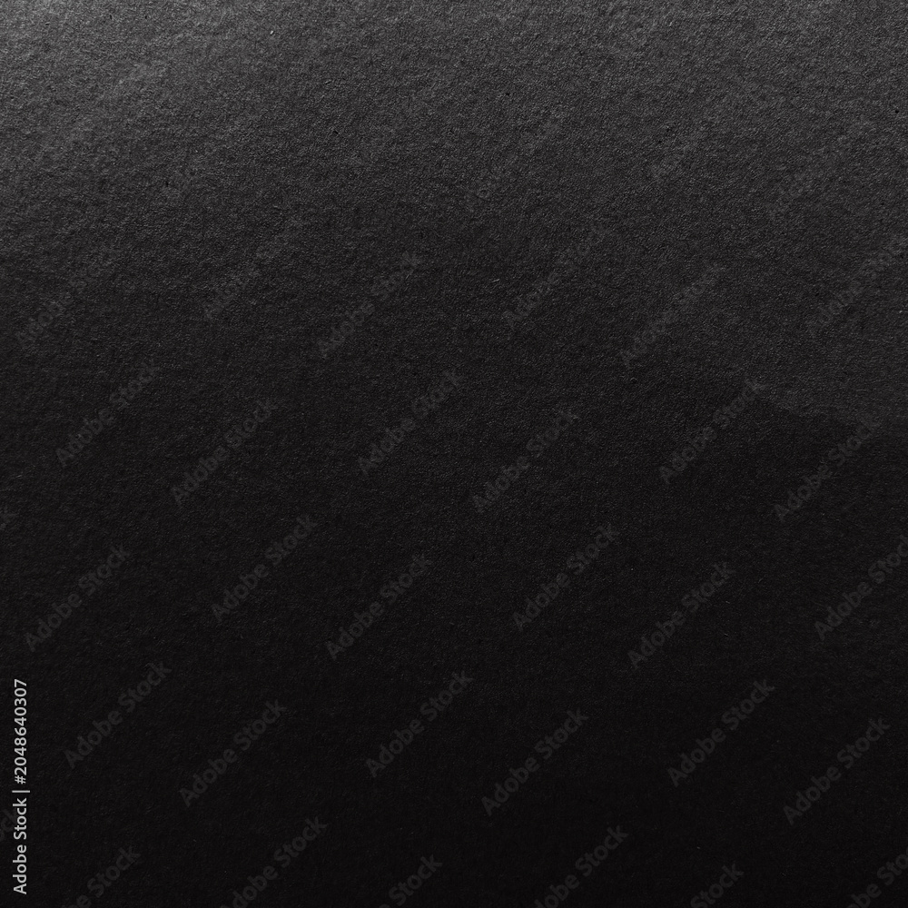 Fototapeta premium Dark textured black background with copy space