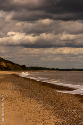 Bild auf Leinwand Dunwich Beach Under a Stormy Sky, Suffolk Coast, England