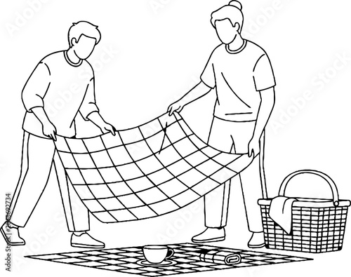 Two People Setting Up Checkered Picnic Blanket Outdoors.