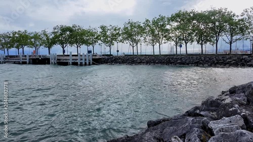 Slow Motion Panning View of Stormy Lake Geneva Marina. Ouchy, Lausanne, Switzerland.