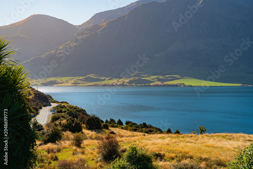 The light and shadows on the lake beneath the mountains, Lake Hawea, New Zealand
