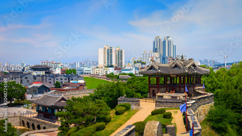 фотографія Suwon Hwaseong Fortress and Suwon City skyline in Suwon‑si, Gyeonggi‑do, South K