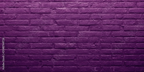 Rough textured purple brick wall surface background with consistent color ideal for creative design and copy space
