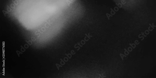 Obraz na płótnie Abstract light and shadow play on a dark textured surface, creating a moody and mysterious atmosphere
