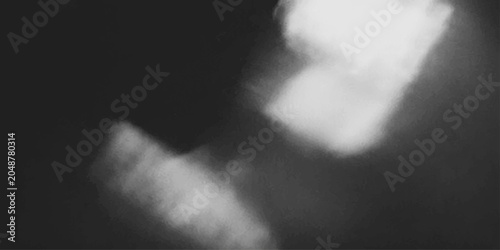 Tableau sur toile Two bright spotlights pierce the darkness, creating an atmospheric and dramatic visual