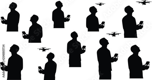 Tableau sur toile Silhouettes set of drone operators looking up while navigating flying quadcopter
