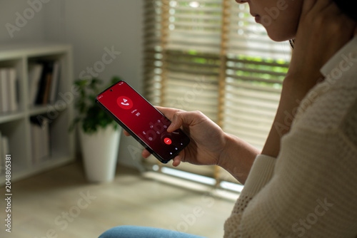 Fotografie Woman calling emergency number 911 for crisis situation