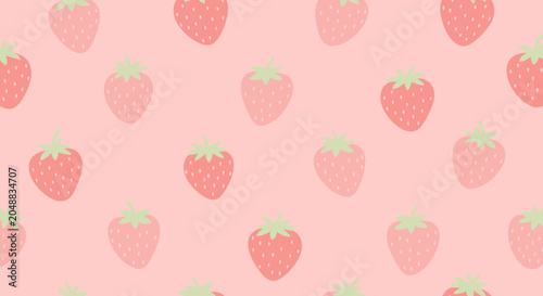 Fresh strawberries on pink background closeup.