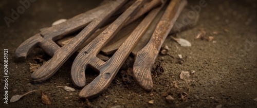 timeworn wooden captivity tools with aged patina