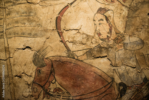Taiyuan, China - May 8 2026: Vivid 6th-century tomb murals at the Taiyuan Beiqi Mural Museum depict the luxurious aristocratic lifestyle, grand processions, and rich cultural fusion of China's Norther