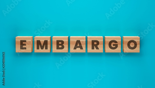Fotografie Trade Embargo Policy Concept Using Wooden Letter Blocks Representing Internation