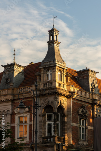A beautiful old building in Krakow at dawn in spring