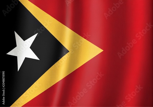 Waving flag of east timor, a democratic republic in southeast asia