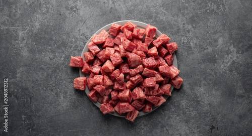 Top view of fresh diced lam...