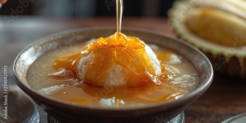 Sweet palm sugar syrup pour...