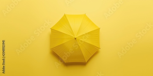 Yellow umbrella resting on ...