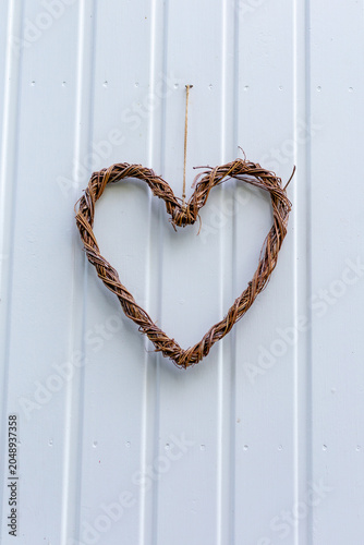wooden heart on the wooden background