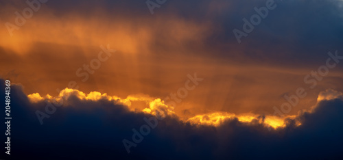 Orange and Grey Sunset Clouds as a Hurricane Approaches.