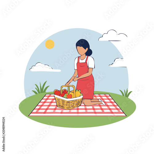 Woman with picnic basket full of fruit on checkered blanket