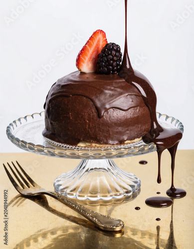 Chocolate Cake with Strawberry and Blackberry on Glass Pedestal