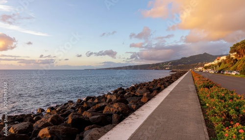 Scenic coastal road by serene ocean.