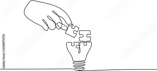 Continuous line of a hand placing puzzle pieces into a light bulb symbolizing idea generation and problem solving