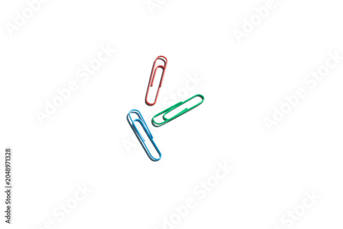 Fotografi Three Colorful Paper Clips Isolated on White Background – Red, Green, and Blue O