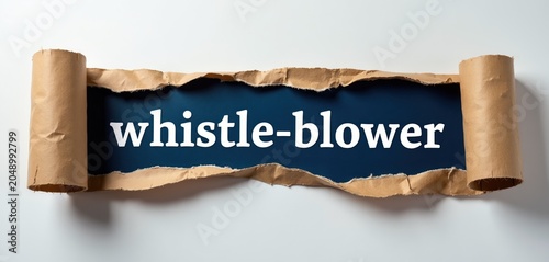 Torn paper reveals text whistleblower on dark background. Concept of corporate fraud expose or internal investigation. Information leak disclosure warning.