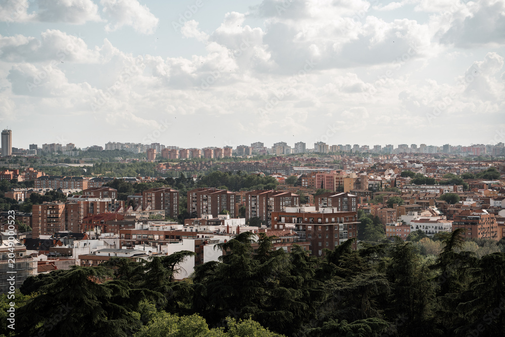 Fototapeta premium Madrid, Spain in Spring with lush gardens, architecture, and historic unesco sites.