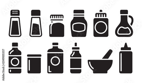 Cuadro en lienzo Condiment bottles and jars for sauces spices and oils in kitchen design