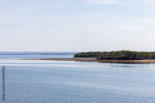 Quadro su tela Coastal shoreline and tidal flats in Prince Edward Island Canada with calm water