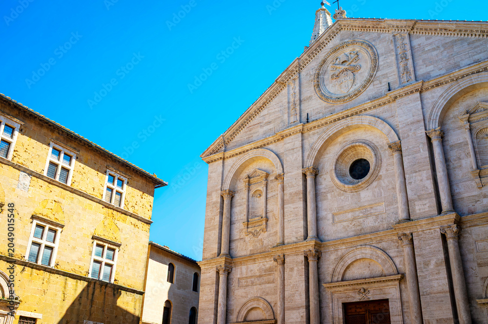 Naklejka premium View of the old palaces and cathedral in Pienza, medieval village of Tuscany (Province of Siena, Italy); is world famous for its renaissance monuments.